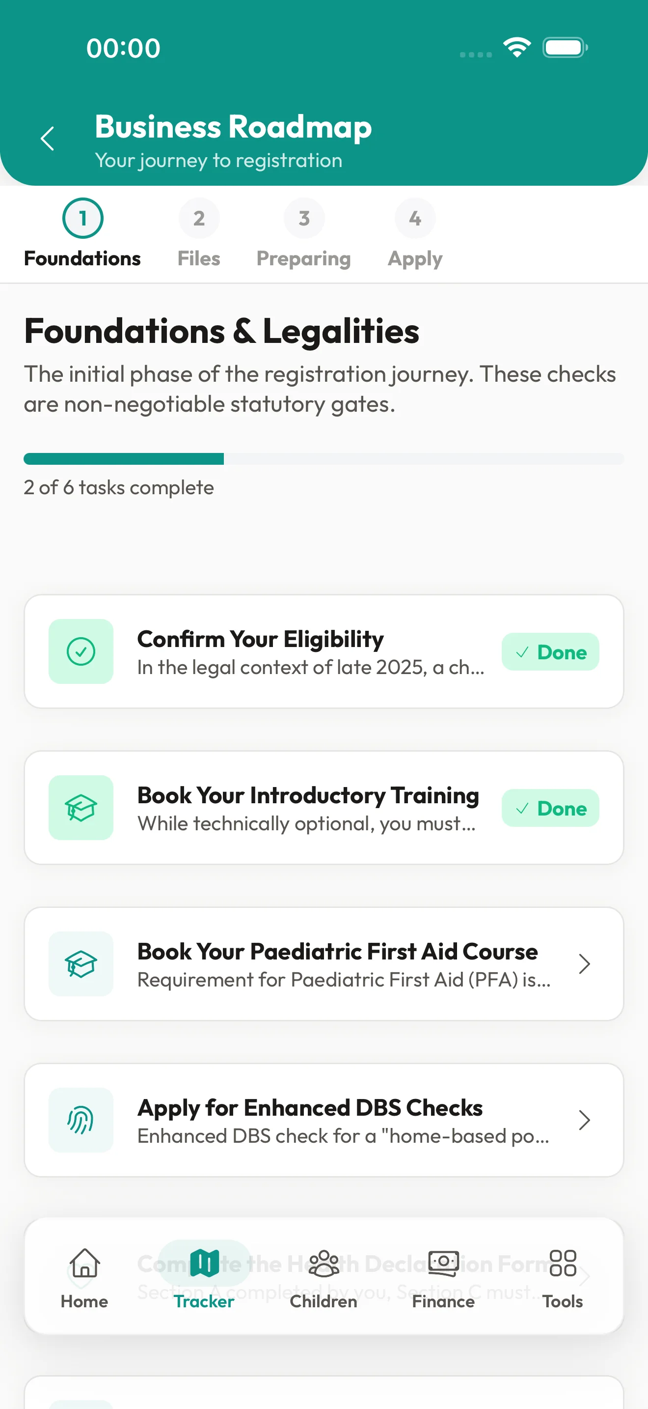 KinderStart business roadmap showing registration tasks such as first aid training and DBS checks
